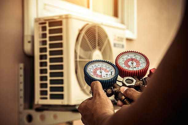 Professional Hvac technician working in Borden, IN